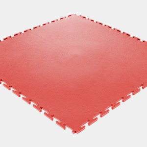 Es ist eine einzelne PVC Bodenplatte in rot zu sehen. Gut sichtbar ist hier das Verzahnungssystem, dass eine einfache Verlegung garantiert.